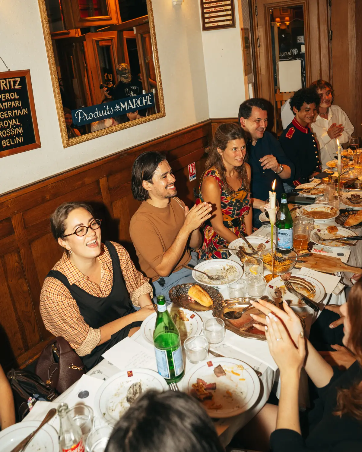 Guests laughing around the table